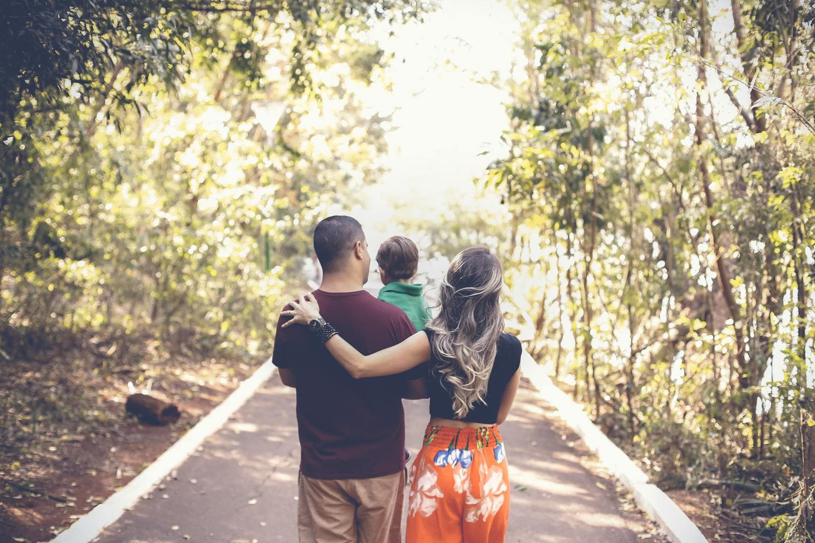 Family enjoying a walk in a park